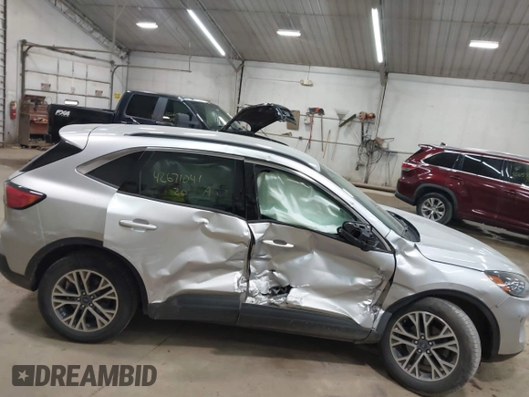 2020 Ford Escape SEL z VIN 1FMCU9H65LUA49816, wystawiony jako IAAI lot #42671041 z przebiegiem 32 541 mil mil oraz . Historia ofert i sprzedaży dostępna na DreamBid. Obrazek 12.