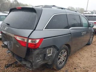 2011 Honda Odyssey EX-L with VIN 5FNRL5H66BB103352, listed as a IAAI auction lot 41901832 with 238,727 mi miles and . Bid and sale history available at carsss.com. Image 4.
