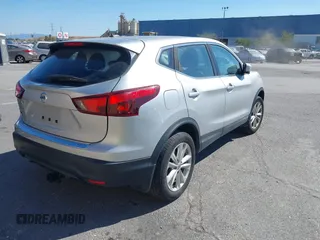 2017 Nissan Rogue SV with VIN JN1BJ1CP7HW017295, listed as a IAAI auction lot 42321408 with 84,430 mi miles and . Bid and sale history available at DreamBid. Image 4.