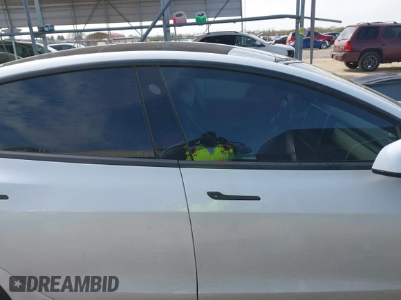 2019 Tesla Model 3 Mid Range with VIN 5YJ3E1EA6KF464615, listed as a IAAI auction lot 41306600 with 79,478 mi miles and . Bid and sale history available at DreamBid. Image 12.