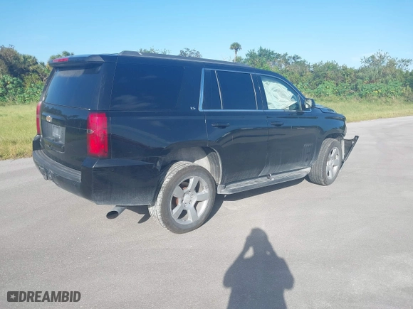 2016 Chevrolet Tahoe LS with VIN 1GNSCAKC1GR455823, listed as a IAAI auction lot 40869580 with 171,029 mi miles. Bid and sale history available at carsss.com. Image 4.