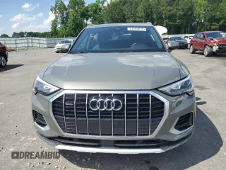 2021 Audi Q3 Premium with VIN WA1AUCF37M1067054, listed as a Copart auction lot 57299815 with 67,334 mi miles and Salvage title. Bid and sale history available at DreamBid. Image 5.