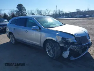 2014 Lincoln MKT EcoBoost with VIN 2LMHJ5AT3EBL54011, listed as a IAAI auction lot 41639994 with 138,032 mi miles and . Bid and sale history available at DreamBid. Image 1.