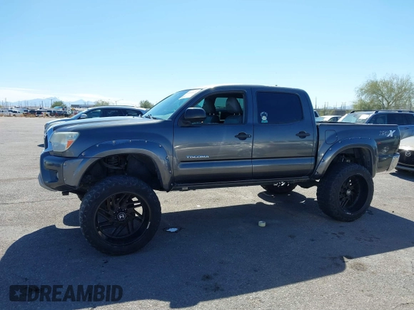 2014 Toyota Tacoma PreRunner with VIN 3TMJU4GN3EM165840, listed as a IAAI auction lot 41666871 with 150,333 mi miles and . Bid and sale history available at DreamBid. Image 15.