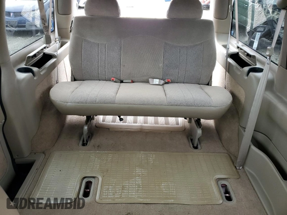 2003 GMC Safari z VIN 1GKEL19X63B510272, wystawiony jako Copart lot #75436594 z przebiegiem 31 989 mil mil oraz Szkody całkowita. Historia ofert i sprzedaży dostępna na DreamBid. Obrazek 10.