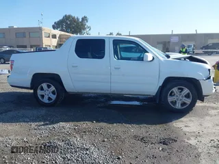 2013 Honda Ridgeline RTL with VIN 5FPYK1F50DB003971, listed as a IAAI auction lot 41946344 with 240,051 mi miles. Bid and sale history available at carsss.com. Image 13.