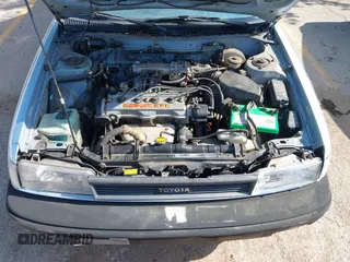 1990 Toyota Corolla z VIN JT2AE94A1L3367594, wystawiony jako IAAI lot #42557468 z przebiegiem 136 600 mil mil oraz . Historia ofert i sprzedaży dostępna na DreamBid. Obrazek 10.