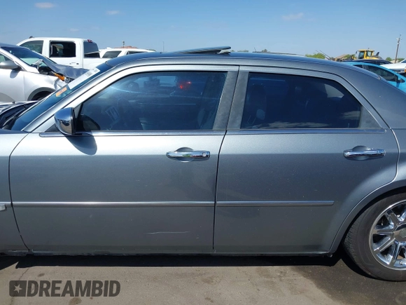 2006 Chrysler 300 C with VIN 2C3KA63H56H313967, listed as a IAAI auction lot 42056998 with 143,592 mi miles and . Bid and sale history available at carsss.com. Image 14.