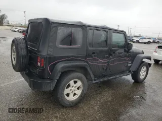 2009 Jeep Wrangler Unlimited X with VIN 1J4GA39119L755818, listed as a Copart auction lot 47886245 with 187,972 mi miles and Salvage Title. Bid and sale history available at carsss.com. Image 3.