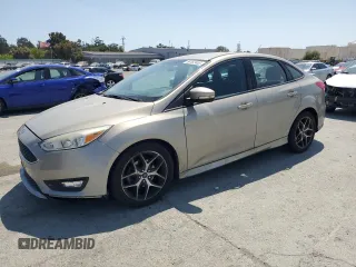 2015 Ford Focus SE with VIN 1FADP3F29FL281543, listed as a Copart auction lot 58182465 with 128,166 mi miles and Salvage title. Bid and sale history available at DreamBid. Image 1.