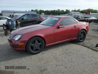 2001 Mercedes-Benz SLK 230/320 z VIN WDBKK65F71F177838, wystawiony jako Copart lot #58118125 z przebiegiem 156 970 mil mil oraz Szkody całkowita. Historia ofert i sprzedaży dostępna na DreamBid. Obrazek 1.