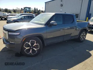 2022 Rivian R1T Adventure Package with VIN 7FCTGAAA5NN014843, listed as a Copart auction lot 47668545 with 42,640 mi miles and Salvage Title. Bid and sale history available at carsss.com. Image 1.