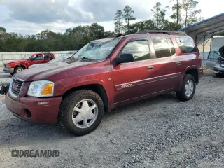 2003 GMC Envoy SLE with VIN 1GKET16P836243276, listed as a Copart auction lot 74170594 with 182,555 mi miles and Salvage Title. Bid and sale history available at DreamBid. Image 1.