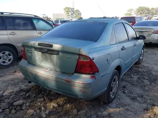 2007 Ford Focus S with VIN 1FAFP34N97W323618, listed as a IAAI auction lot 42003664 with 229,254 mi miles and . Bid and sale history available at carsss.com. Image 4.