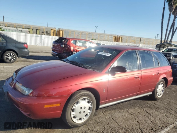 1997 Saturn SW z VIN 1G8ZK8272VZ371975, wystawiony jako Copart lot #75880424 z przebiegiem 121 194 mil mil oraz Szkody całkowita. Historia ofert i sprzedaży dostępna na DreamBid. Obrazek 1.
