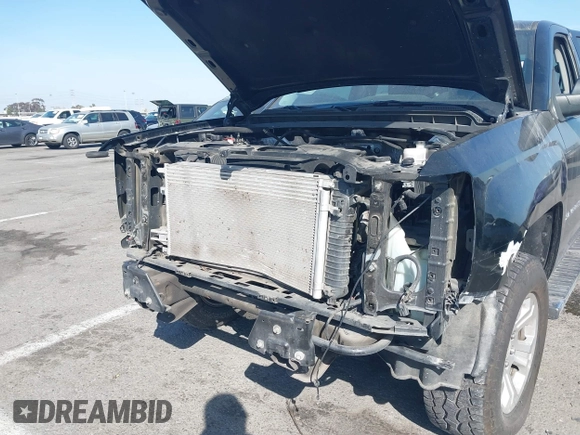 2017 Chevrolet Silverado 1500 LS with VIN 1GCRCNEC2HZ331474, listed as a IAAI auction lot 41707267 with 86,027 mi miles and . Bid and sale history available at DreamBid. Image 6.