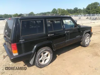 2001 Jeep Cherokee Sport with VIN 1J4FF48S61L621324, listed as a IAAI auction lot 42586960 with 213,198 mi miles and . Bid and sale history available at DreamBid. Image 4.