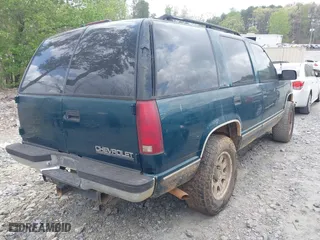 1995 Chevrolet Tahoe with VIN 1GNEK13K3SJ412971, listed as a IAAI auction lot 41940461 with 425,128 mi miles. Bid and sale history available at carsss.com. Image 4.