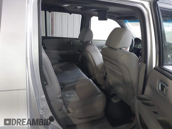 2011 Honda Pilot Touring with VIN 5FNYF4H90BB084692, listed as a IAAI auction lot 41867622 with 62,805 mi miles. Bid and sale history available at carsss.com. Image 8.