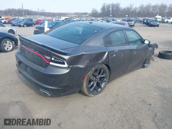 2019 Dodge Charger SXT with VIN 2C3CDXBG8KH668202, listed as a IAAI auction lot 41710007 with 72,640 mi miles. Bid and sale history available at carsss.com. Image 4.