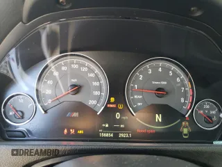 2015 BMW M4 with VIN WBS3R9C57FK331291, listed as a Copart auction lot 47927615 with 156,854 mi miles and Salvage Title. Bid and sale history available at carsss.com. Image 9.