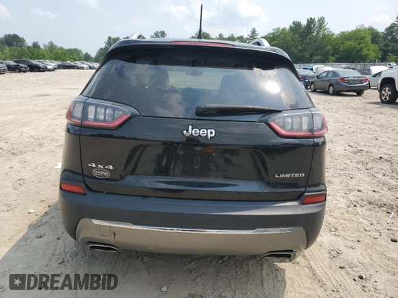 2019 Jeep Cherokee High Altitude with VIN 1C4PJMDX2KD283992, listed as a Copart auction lot 59849195 with 103,463 mi miles and Salvage title. Bid and sale history available at DreamBid. Image 6.