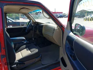 2004 Ford Ranger XL Fleet z VIN 1FTYR44U84PA62062, wystawiony jako IAAI lot #42314908 z przebiegiem 150 302 mil mil oraz . Historia ofert i sprzedaży dostępna na DreamBid. Obrazek 5.