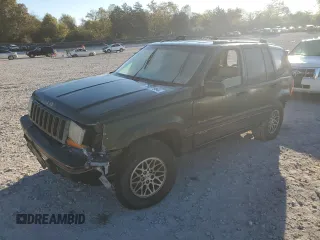 1995 Jeep Grand Cherokee Limited with VIN 1J4GZ78Y7SC730118, listed as a Copart auction lot 76031964 with 184,074 mi miles and Salvage Title. Bid and sale history available at carsss.com. Image 1.