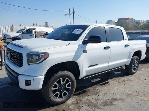2018 Toyota Tundra 2WD SR5 with VIN 5TFEM5F11JX128585, listed as a IAAI auction lot 41965169 with 83,149 mi miles. Bid and sale history available at carsss.com. Image 2.