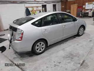 2007 Toyota Prius z VIN JTDKB20U977649489, wystawiony jako IAAI lot #41772600 z przebiegiem 248 525 mil mil oraz . Historia ofert i sprzedaży dostępna na DreamBid. Obrazek 4.