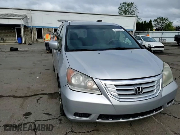2010 Honda Odyssey EX z VIN 5FNRL3H43AB095521, wystawiony jako Copart lot #57322365 z przebiegiem 208 226 mil mil oraz Szkoda całkowita • Salvage title. Historia ofert i sprzedaży dostępna na DreamBid. Obrazek 14.