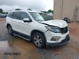 2016 Honda Pilot EX-L with VIN 5FNYF6H57GB038826, listed as a IAAI auction lot 42473974 with 166,684 mi miles and . Bid and sale history available at DreamBid. Image 1.