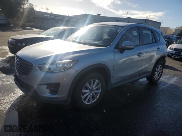 2016 Mazda CX-5 Sport with VIN JM3KE2BEXG0904597, listed as a Copart auction lot 86293834 with 63,343 mi miles and Salvage Title. Bid and sale history available at carsss.com. Image 1.