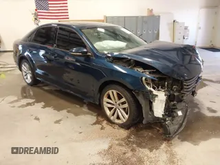 2019 Volkswagen Passat 2.0T Wolfsburg Edition with VIN 1VWLA7A30KC008917, listed as a IAAI auction lot 40791328 with 63,747 mi miles. Bid and sale history available at carsss.com. Image 1.