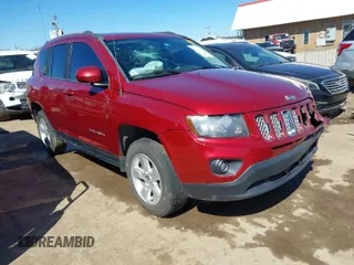 2016 Jeep Compass Latitude with VIN 1C4NJCEB9GD575117, listed as a IAAI auction lot 41716611 with 107,295 mi miles. Bid and sale history available at carsss.com. Image 1.