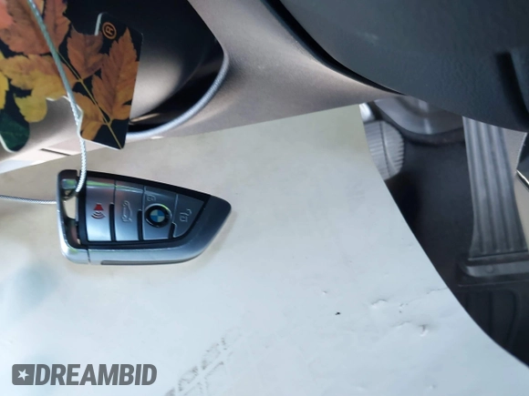 2022 BMW 2 Series 228i with VIN WBA53AK00N7K45327, listed as a IAAI auction lot 41557762 with 24,432 mi miles and . Bid and sale history available at DreamBid. Image 11.