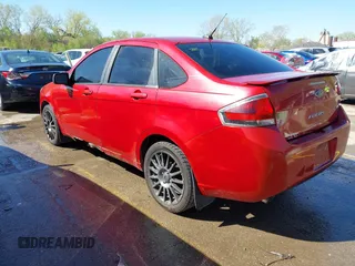 2010 Ford Focus SES with VIN 1FAHP3GN9AW156110, listed as a IAAI auction lot 42008652 with 203,931 mi miles. Bid and sale history available at carsss.com. Image 3.
