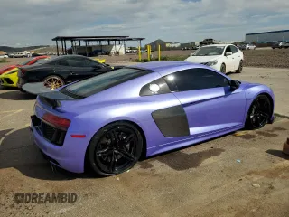 2017 Audi R8 z VIN WUAKBAFX2H7903141, wystawiony jako Copart lot #46552054 z przebiegiem 20 096 mil mil oraz . Historia ofert i sprzedaży dostępna na DreamBid. Obrazek 3.