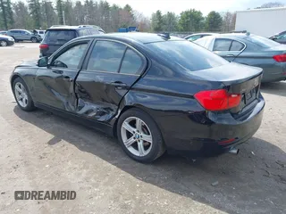 2014 BMW 3 Series 320i xDrive with VIN WBA3C3C51EP662162, listed as a IAAI auction lot 42019994 with 78,066 mi miles. Bid and sale history available at carsss.com. Image 3.