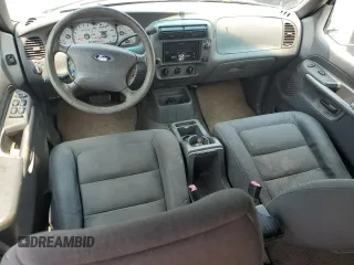 2001 Ford Explorer Sport Trac with VIN 1FMZU67E51UA46266, listed as a Copart auction lot 56628755 with 210,524 mi miles and Salvage title. Bid and sale history available at DreamBid. Image 8.