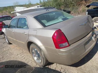 2006 Chrysler 300 Touring with VIN 2C3KA53G26H230479, listed as a IAAI auction lot 41871247 with 91,997 mi miles. Bid and sale history available at carsss.com. Image 3.