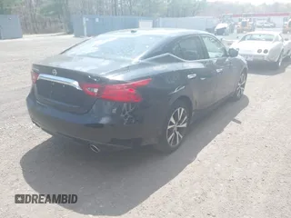 2016 Nissan Maxima 3.5 SV with VIN 1N4AA6AP1GC406660, listed as a IAAI auction lot 42097601 with 267,723 mi miles. Bid and sale history available at carsss.com. Image 4.