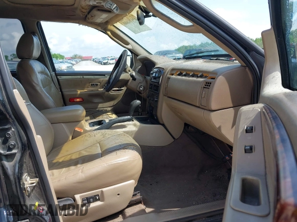 2002 Jeep Grand Cherokee Limited with VIN 1J8GX58N32C130002, listed as a IAAI auction lot 42179840 with 246,661 mi miles and . Bid and sale history available at DreamBid. Image 5.