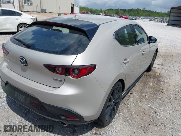 2022 Mazda Mazda3 Hatchback Premium with VIN JM1BPAML5N1507556, listed as a IAAI auction lot 42087802 with 56,507 mi miles. Bid and sale history available at carsss.com. Image 4.