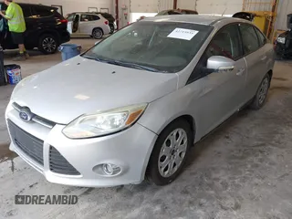 2012 Ford Focus SE with VIN 1FAHP3F23CL385622, listed as a IAAI auction lot 42715935 with 224,110 mi miles and . Bid and sale history available at DreamBid. Image 2.