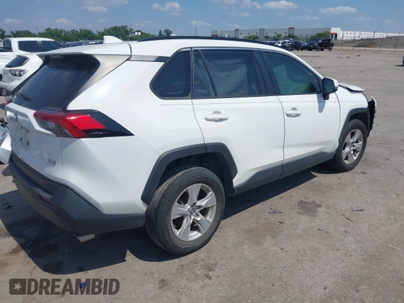 2021 Toyota RAV4 XLE with VIN JTMW1RFV2MD063839, listed as a IAAI auction lot 42406891 with 69,490 mi miles and . Bid and sale history available at DreamBid. Image 4.