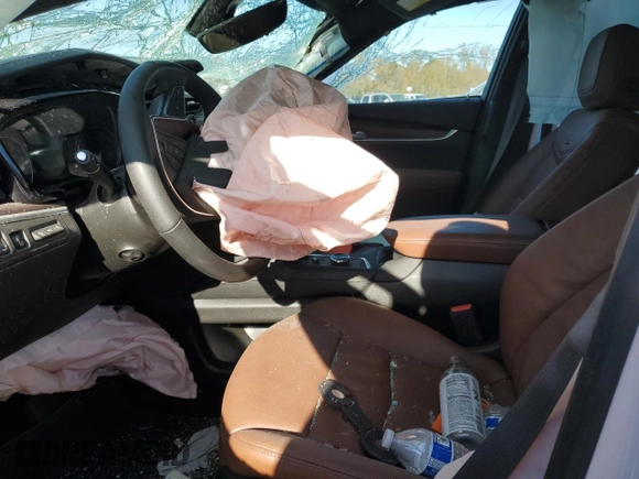 2024 Cadillac XT5 FWD Premium Luxury with VIN 1GYKNCRS5RZ739383, listed as a Copart auction lot 82047614 with Not provided miles and Salvage title. Bid and sale history available at DreamBid. Image 7.