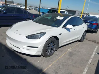 2020 Tesla Model 3 Standard Range Plus with VIN 5YJ3E1EA1LF659765, listed as a IAAI auction lot 41834411 with 42,433 mi miles and . Bid and sale history available at carsss.com. Image 17.