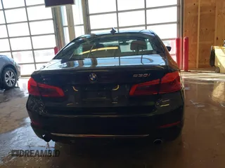 2018 BMW 5 Series 530i xDrive with VIN WBAJA7C55JWA73459, listed as a IAAI auction lot 41634921 with 64,759 mi miles and . Bid and sale history available at carsss.com. Image 16.
