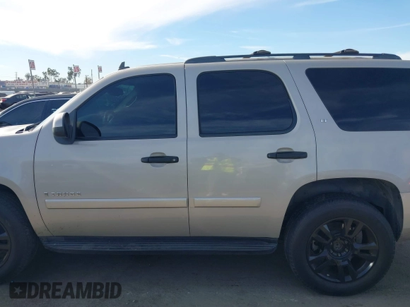2007 Chevrolet Tahoe LTZ with VIN 1GNFC13077J399911, listed as a IAAI auction lot 41141878 with Not provided miles and . Bid and sale history available at DreamBid. Image 13.